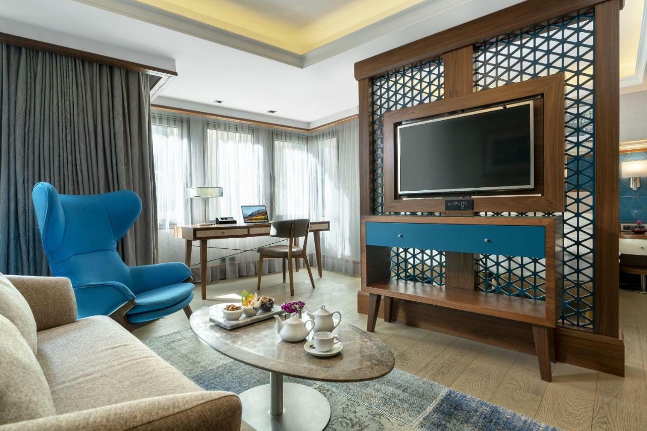 فندق راديسون بلو بوسفوروس اسطنبول المظهر الخارجي الصورة A living room at the hotel